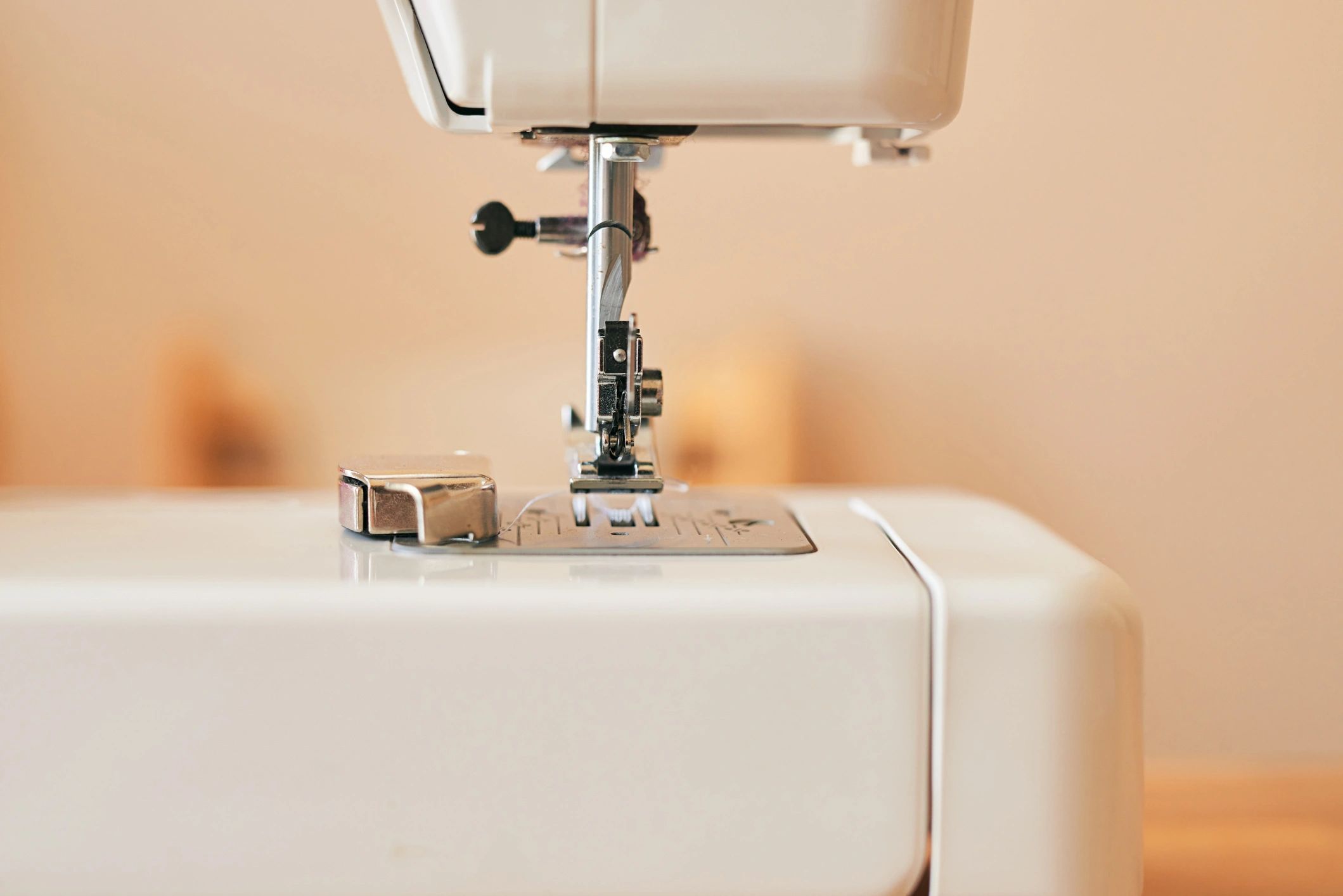 Close-up of an embroidery machine stitching fabric